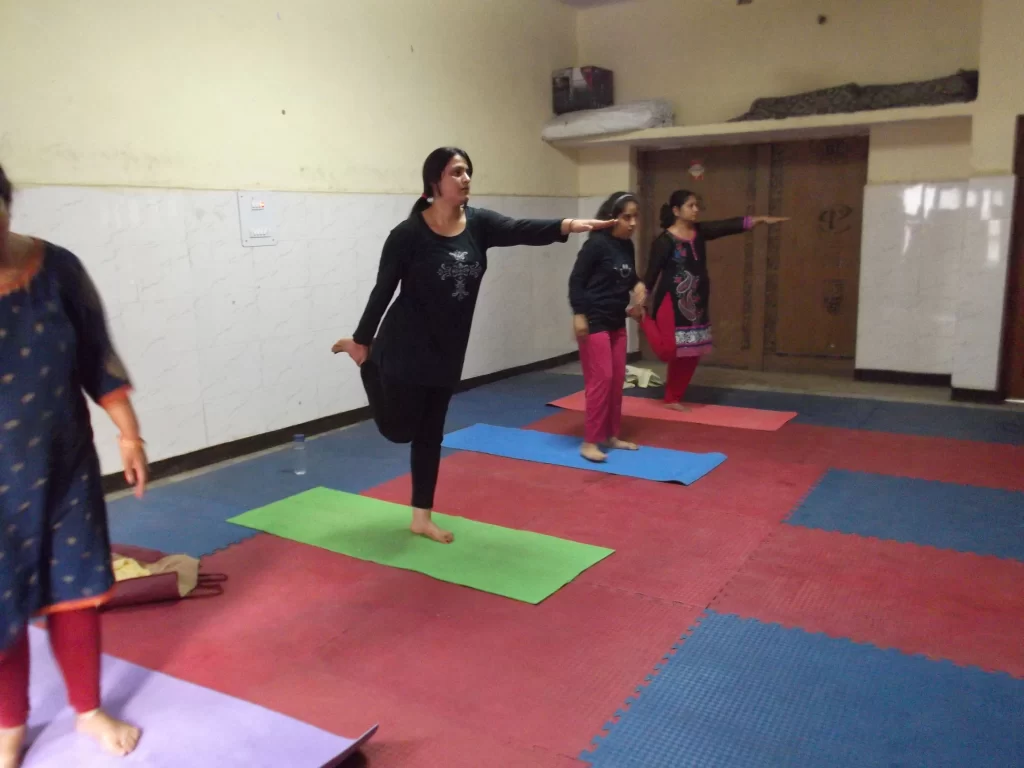 Women performing Yoga at Lakshya Trust Lakshya Paathshaala
